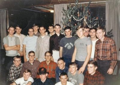 Pledge class of 1966-67 in front of newly decorated Christmas tree